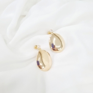 0600507300 - BRINCO OVAL COM ZIRCONIA NA BASE<br>QTDE PCT: 5 PAR - VAL PCT: R$ 34,50 - PESO UNIT: 8,800g