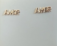 1300639400 - BRINCO ESTAMPADO AMOR<br>QTDE PCT: 5 PAR - VAL PCT: R$ 5,00 - PESO UNIT: 0,520g