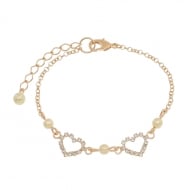 0103006300 - PULSEIRA DE PEROLA COM CORACAO DE STRASS<br>QTDE PCT: 3 PC - VAL PCT: R$ 18,15 - PESO UNIT: 2,660g