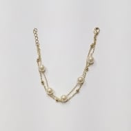 0103013000 - PULSEIRA DE PROLA 8MM COM BOLINHAS<br>QTDE PCT: 3 PC - VAL PCT: R$ 23,79 - PESO UNIT: 3,870g