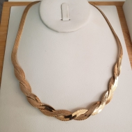 2204036600 - COLAR FITA TRANADO<br>QTDE PCT: 2 PC - VAL PCT: R$ 25,80 - PESO UNIT: 17,000g