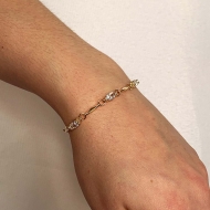 2303023600 - PULSEIRA ZIRCONIAS NAVETES COM OSSINHOS<br>QTDE PCT: 5 PC - VAL PCT: R$ 49,00 - PESO UNIT: 3,000g