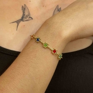 2303022200 - PULSEIRA CIGANINHA FLORES DE LADO<br>QTDE PCT: 5 PC - VAL PCT: R$ 47,00 - PESO UNIT: 3,900g
